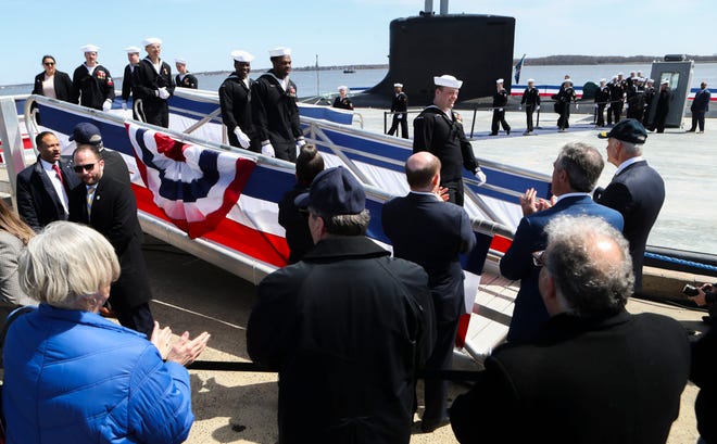 The Delaware congressional delegation and Gov. John Carney greet sailors of the USS Delaware attack submarine after the commissioning commemoration at the Port of Wilmington on the Delaware River Saturday, April 2, 2022.