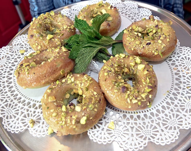 Pistachio donuts, one of the things Fig Tree Cafe owner Maria Ferguson kept from the restaurant's time as The Mills, are more healthful because they are baked not fried.