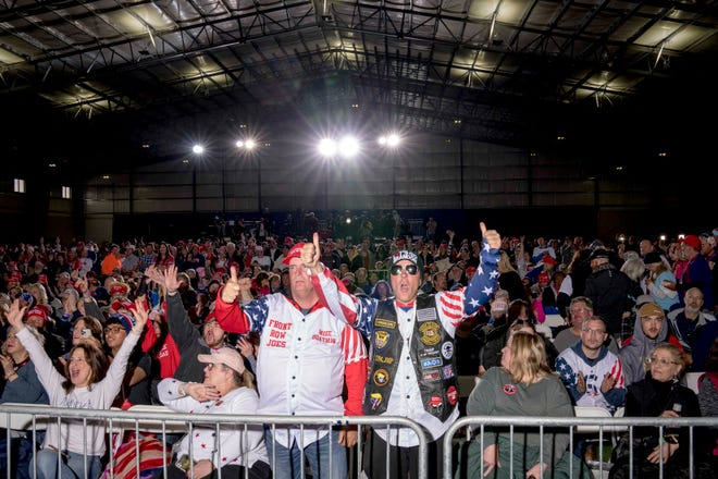 The crowd cheers during the Save America Rally at Michigan Stars Sport Center in Washington Township, Mich. on April 2, 2022.