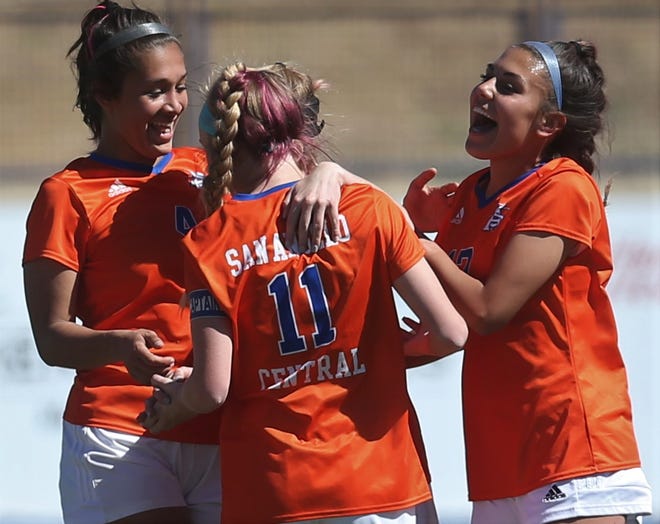 San Angelo Central High School's Abi Kalnbach, 11, is congratulated by teammates after scoring a goal against El Paso Eastlake in a Class 6A bidistrict playoff in Midland on Thursday, March 24, 2022.