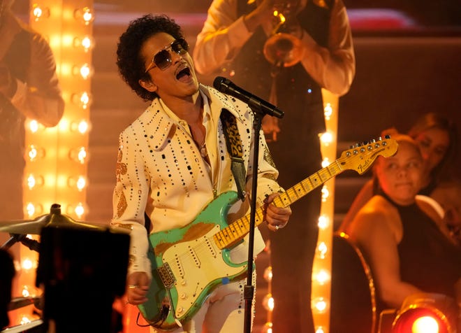 Bruno Mars from Silk Sonic performs “777” during the 64th Annual Grammy Awards.