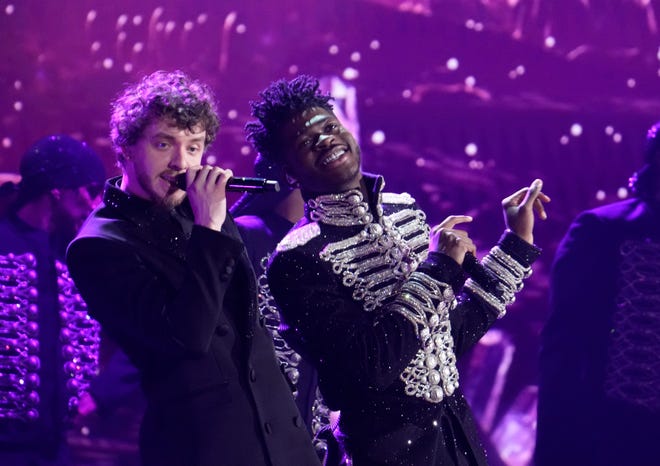 Lil Nas X (right) performs “Industry Baby” with Jack Harlow at the Grammy Awards.