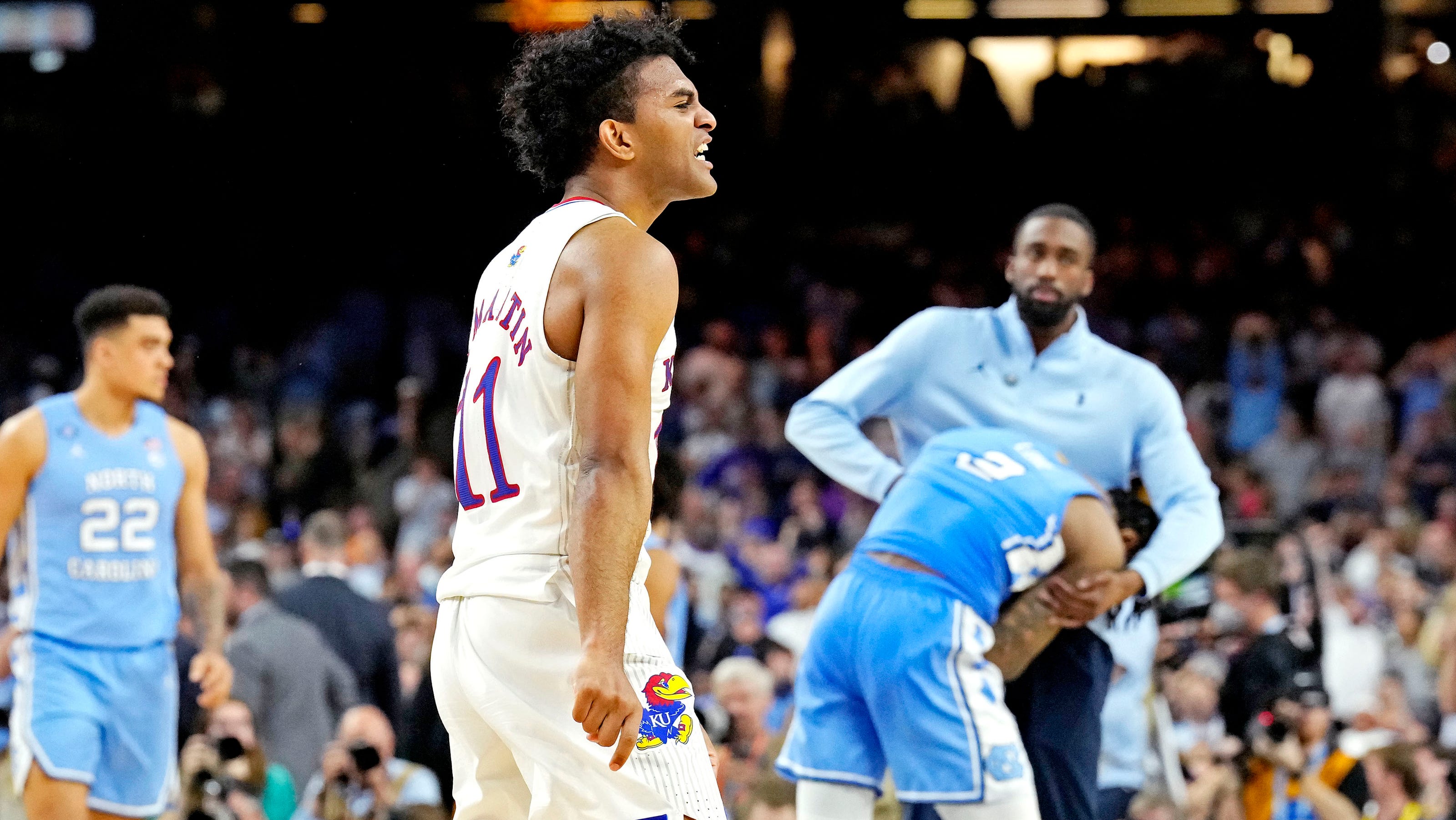 Physical, emotional pain piles on battered UNC in NCAA championship game loss to Kansas Physical, emotional pain piles on battered UNC in NCAA championship game loss to Kansas