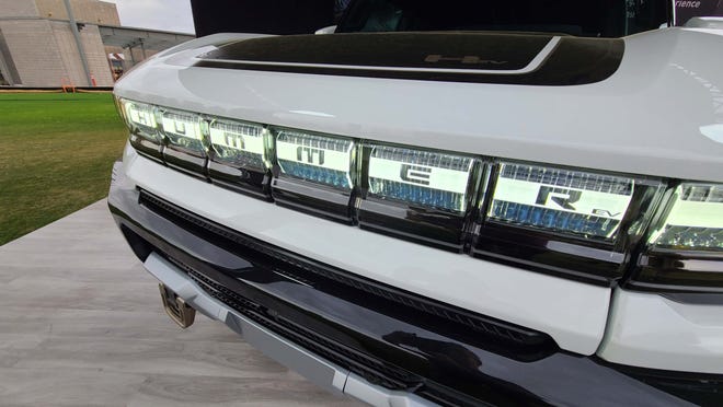 Microscopic reflectors in the 2022 GMC Hummer EV's light bar reflect recessed LED lights to create the vehicle's signature running light.