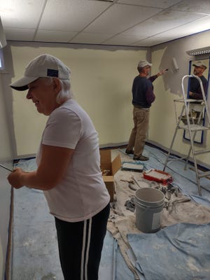 Volunteers, including several people with the Fremont Exchange Club, painted rooms at Fremont's Community Fortress homeless shelter Sunday. The Fremont Exchange Club is trying to revitalize its membership after at the COVID-19 pandemic.