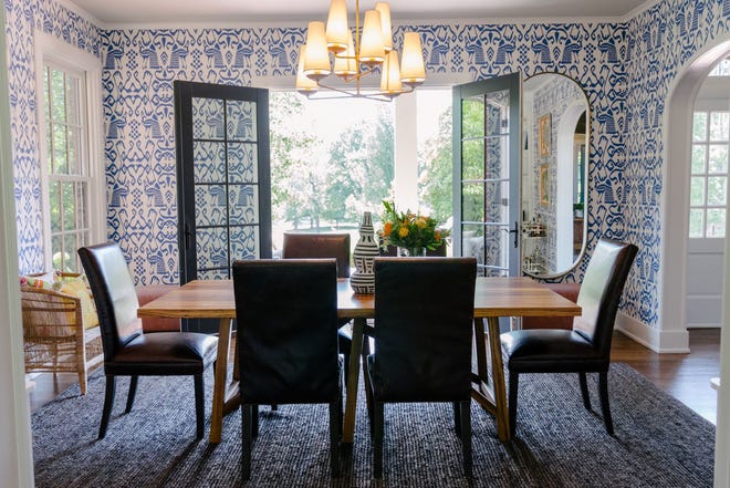 The dining room is accessible from both the front terrace and kitchen in this classic Colonial home in Cherokee Park in Louisville.