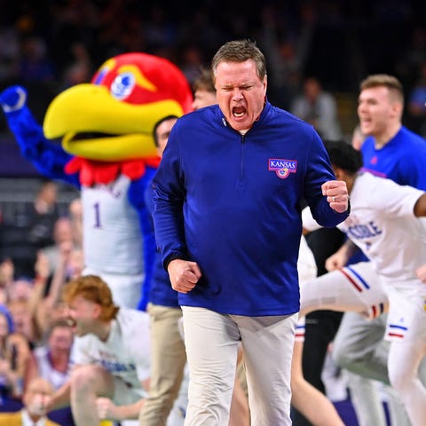 Kansas Jayhawks head coach Bill Self and the bench