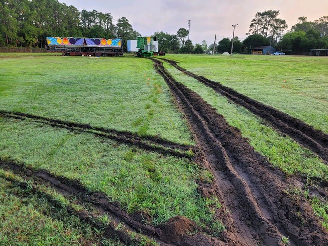 The back part of the Lake County Fairgrounds was flooded and three large trucks carrying rides got stuck.