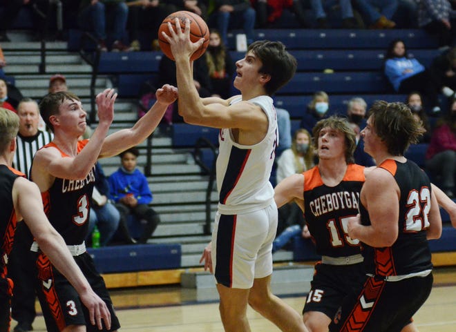 Defenses did their best to contain Boyne City's Alex Calcaterra (center) though most came away unsuccessful against the now Division 2 AP All-State guard.