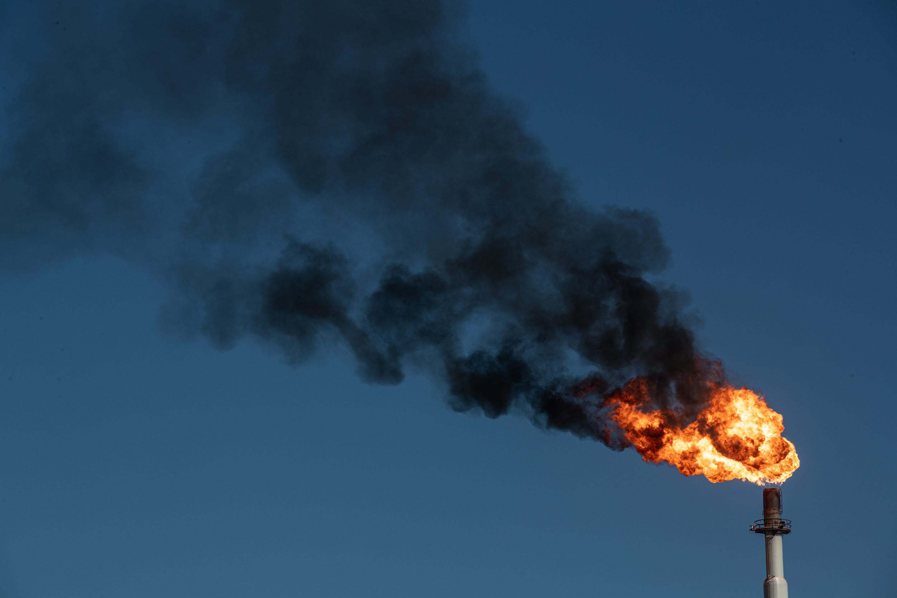 A flare, or emissions event, at the Javelina gas facility that abuts Dona Park is seen from the neighborhood in Corpus Christi, Texas, on March 16, 2022.