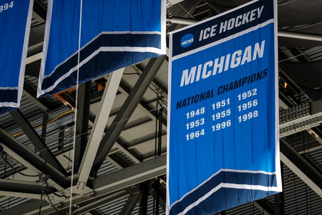 A banner for the Michigan National Hockey Championship hangs over the ice during training as the Wolverines prepare for a Frozen Four match against Denver at TD Garden in Boston on Wednesday, April 6, 2022.