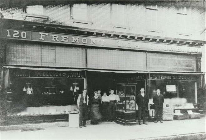 Fremont Tea Store, about 1915. Beesch's Fremont Tea Store was located in the Roberts Block at 118-120 S. Front St., Fremont. Employees are proudly posed in this photo, taken about 1915, when W. F. Schmidt was the manager. Notice the store also sold Libbey Cut Glass. Later businesses in this building included the Bintz Company, the Open Book bookstore, and currently The Party Starts Here. ( Submitted by Larry Michaels and Krista Michaels).