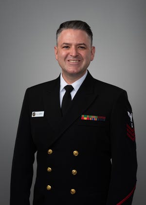 Musician 1st Robert Kurth will return home to Ohio on April 22 for a concert with the Sea Chanters of the U.S. Navy band