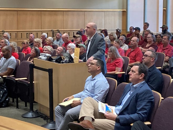Paul Hellman, Shasta County Resource Management director, addresses the Planning Commission during a packed meeting on April 6.