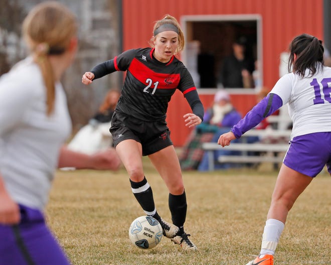 Clinton's Madalyn Freitas controls the ball during a game against Bronson in the 2022 season.