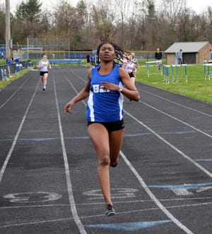 Broadfording's Aji Mbye reaches the finish line all alone in first place in the girls 200-meter dash in a meet at Williamsport.