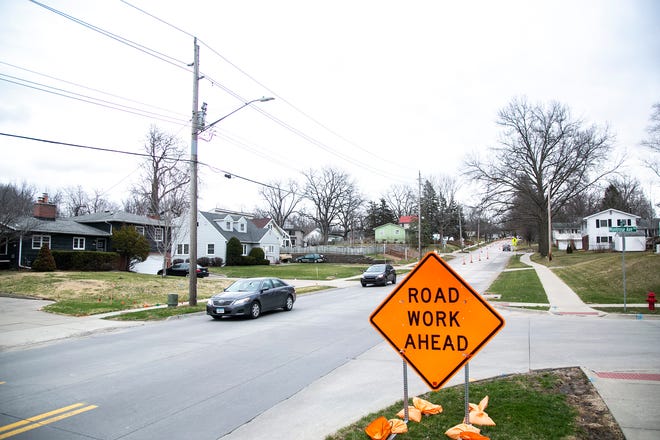 Construction cones line a portion of Rochester Avenue on Wednesday in Iowa City. Work on the pavement, sewer system and sidewalks is expected to continue through December 2023.