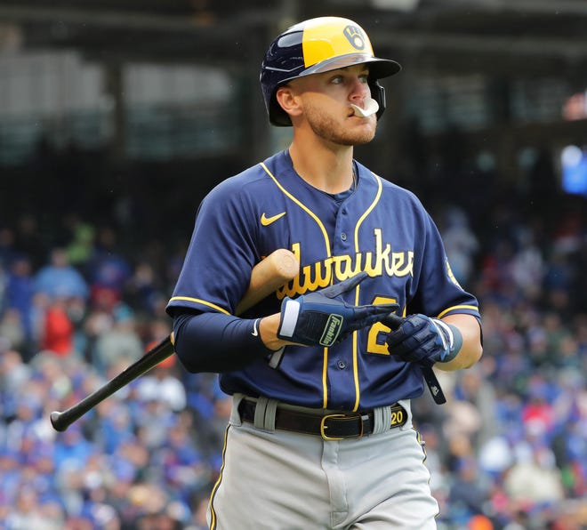 Milwaukee Brewers second baseman Mike Brosseau walks back to the dugout after striking out during their game against the Chicago Cubs.