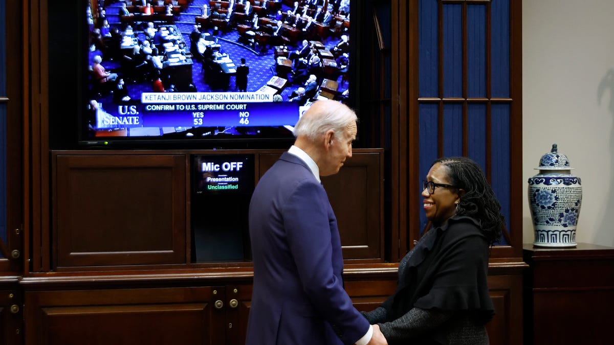 U.S. President Joe Biden congratulates Ketanji Brown Jackson moments after the U.S. Senate confirmed her to be the first Black woman to be a justice on the Supreme Court in the Roosevelt Room at the White House on April 7, 2022 in Washington, DC. 
