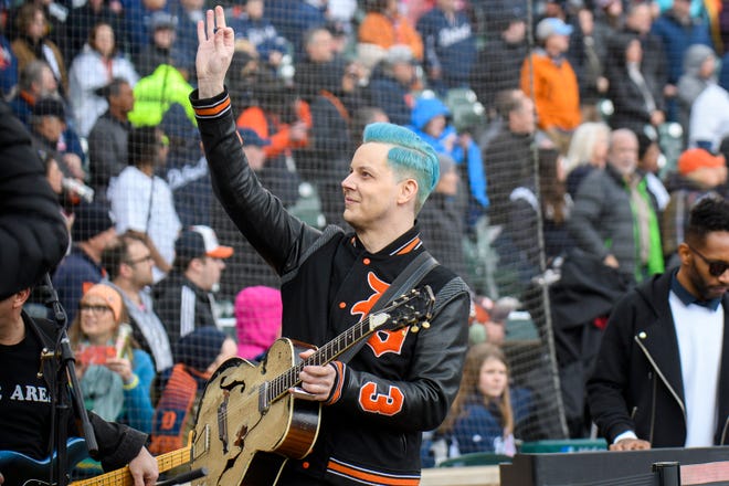 Detroit native Jack White waves to fans during Opening Day festivities for the Detroit Tigers at Coomerica Park, Friday, April 8, 2022 in Detroit.