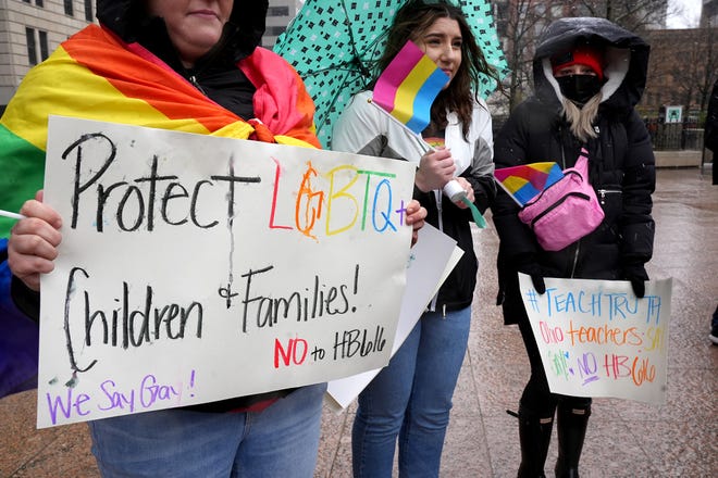 Outside the Ohio Statehouse, people protest against HB 616, Ohio's "Don't Say Gay" Bill on Saturday, April 9, 2022. The bill was just introduced in the House by state Reps. Mike Loychik, R-Bazetta, and Jean Schmidt, R-Loveland.