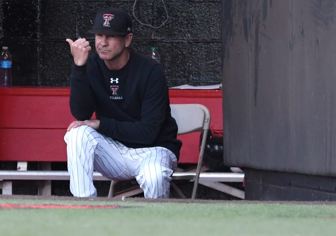 Texas Tech's head baseball coach Tim Tadlock gestures in the dugout against Kansas State, Friday, April 8, 2022, at Dan Law Field at Rip Griffin Park. Texas Tech won, 6-3.