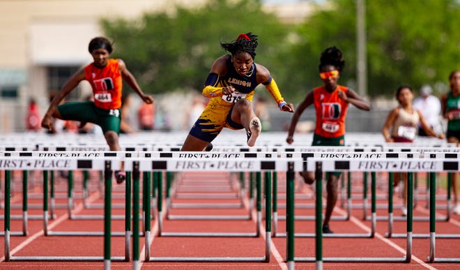 Lehigh’s Sanaa Geter wins the 100 meter hurdles at Lee County Athletic Conference Championships at Dunbar High School on Saturday, April 9, 2022. Morrison won and Young was second.  