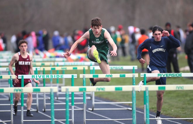 Riverside's Gavin Luts clears a hurdle while competing in the 110-meter hurdles at Riverside High School earlier this month.