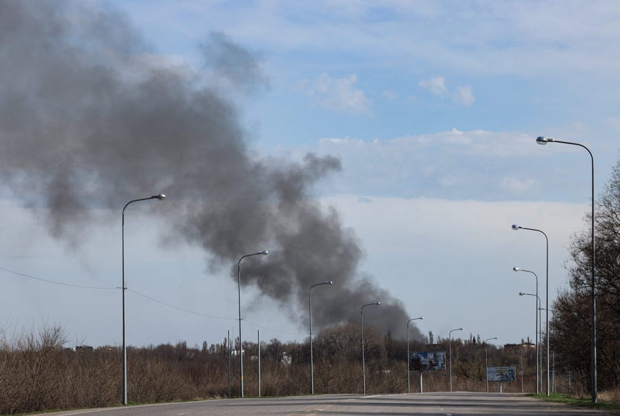 Smoke rises from the airport in Dnipro, Ukraine, after a Russian attack on April 10, 2022.