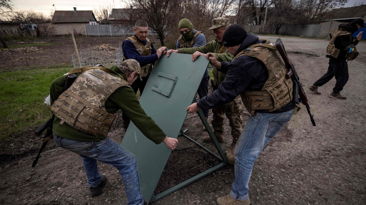 Territorial guards strengthen their position in the town of Barvinkove, eastern Ukraine, on April 9, 2022.