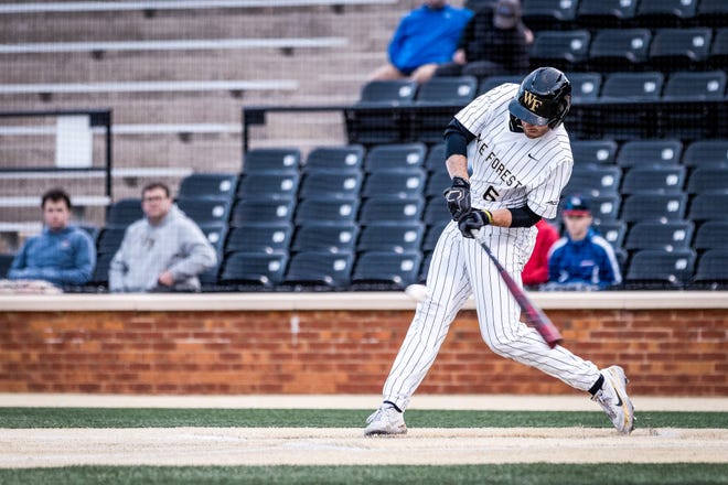 Wake Forest redshirt junior infielder Michael Turconi makes contact with a ball during the Demon Deacons' 5-2 win over Duke in April in Winston-Salem, NC.