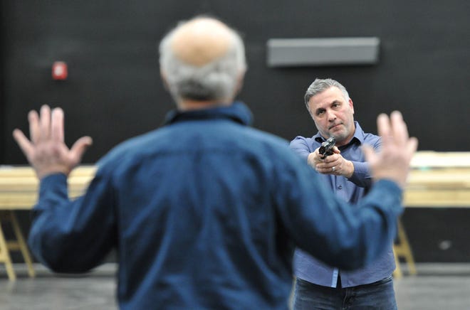 FBI agent Scott Garioloa, played by Arthur Hiou, right, captures Boston mobster Whitey Bulger, played by Paul Kandarian, foreground, during rehearsal of the show 