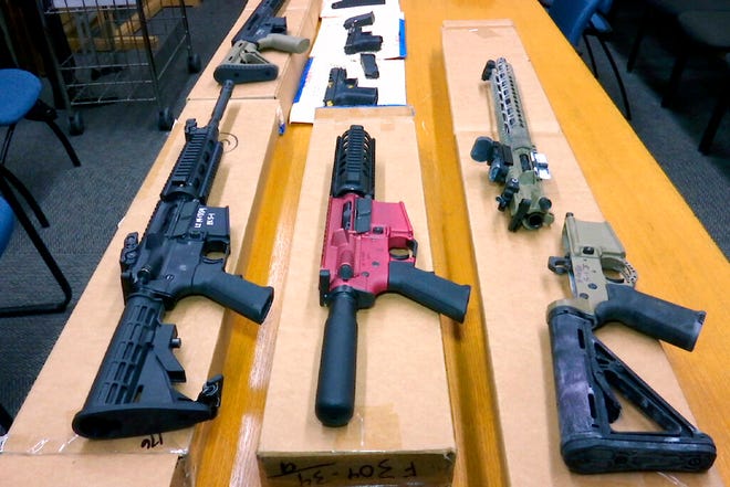 Ghost guns are displayed at the headquarters of the San Francisco Police Department in San Francisco, on Nov. 27, 2019.