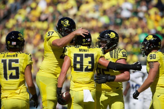Ex-Oregon football player seeks nearly $126M in damages over workouts