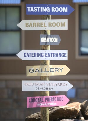 A colorful sign guides patrons around The Winery at Wolf Creek.