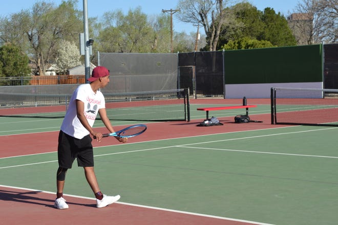 Gruver's Ricky Altamirano prepares to serve the ball in the Region 1-2A tournament at Tascosa's Rebel Tennis Center on April 12, 2022.