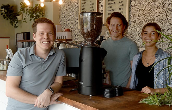 Nick McKague, left, is the owner of Acola Coffee at 300 N. Tenth St., formerly Three Story Coffee. Also shown are James and Emma Briner. The brother and sister baristas formerly worked at Three Story Coffee.