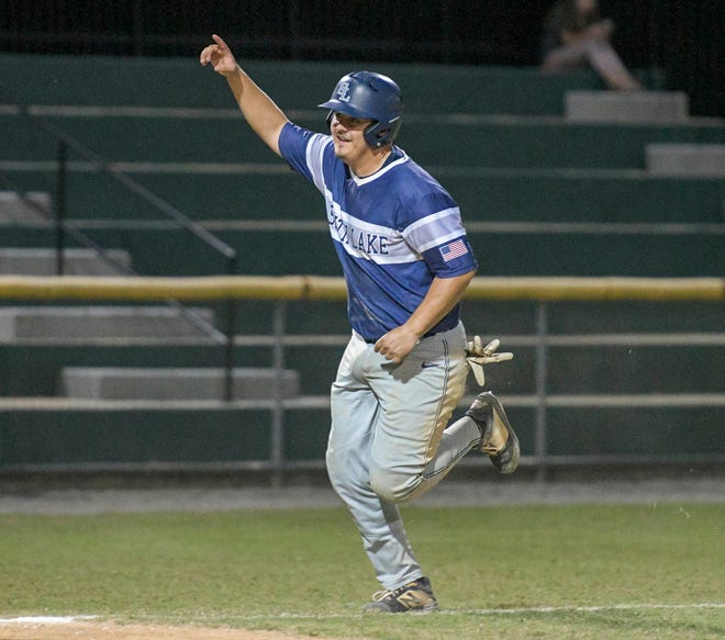 South Lake’s Joey Bustos (2) scores in the eighth inning during Monday's game against Leesburg at Pat Thomas Stadium-Buddy Lowe Field in Leesburg. Bustos picked up the win in relief and scored the game-winning run. [PAUL RYAN / CORRESPONDENT]