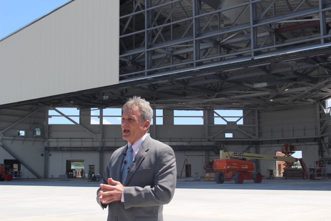 Georgia 1st District Rep. Buddy Carter stands in front of a hangar being constructed on the Savannah Air National Guard base as he voiced his support to keep the Air Dominance Center open. President Joe Biden's 2023 budget proposal calls for shutting the training center down.