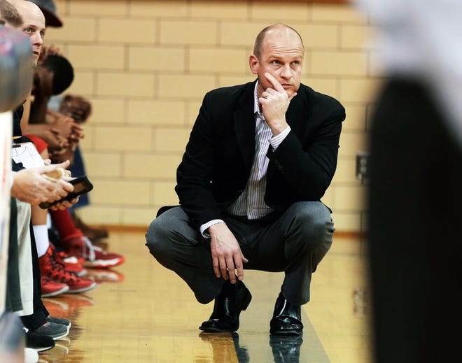North Hagerstown boys basketball coach Kevin Hartman did some of his best thinking while squatting in front of the his bench during games.