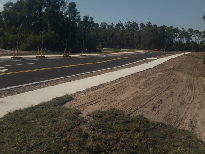 Roads are paved and sidewalks are in place.