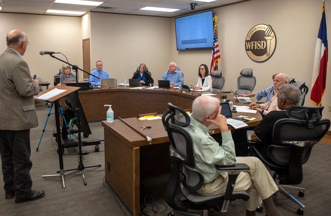 Wichita Falls ISD trustees and staff members listen to an update on construction for the two new high schools during a special session Tuesday, April 12, 2022, at the Education Center.