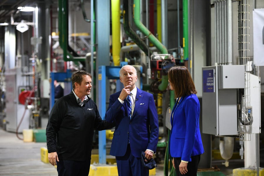 US President Joe Biden (C) speaks with Congresswoman Cindy Axne (IA-03) and Jack Mitchell, Regional Vice President, POET Bioprocessing during a visit at the POET Bioprocessing plant in Menlo, Iowa on April 12, 2022. (Photo by MANDEL NGAN / AFP) (Photo by MANDEL NGAN/AFP via Getty Images)