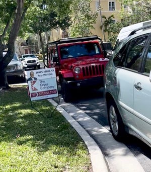 Cars line the street where 65 sets of homebuyers showed up to an open house in Jupiter on April 10, 2022. Fourteen offers were made on the home with the winning bid using an escalation clause of $60,000 over asking price. Contributed John Sholar, Realtor with the Keyes Company