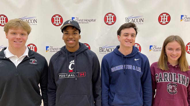 Indian Hill High School seniors Garrett McClung (Denison football), Antwan Peek (University of Cincinnati football), Peter Sheakley (Washington & Lee golf) and Hayden Withers (Universify of South Carolina track & field and cross country) participated in an athletic signing ceremony March 24, 2022.
