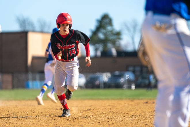 Bound Brook #14 runs to third base against Manville on Tuesday, April 12, 2022 at Manville  High School.