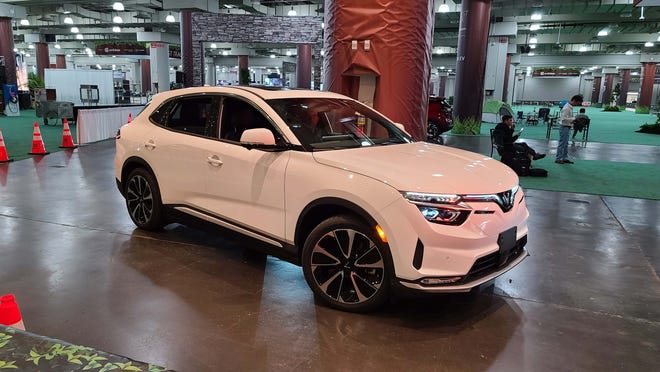 The VinFast VF 8, on the test track at the New York auto show, will be sold sans battery, which will be available separately through a monthly subscription.