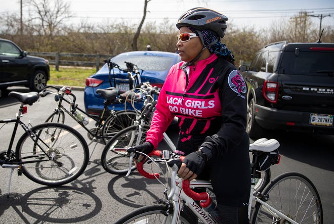 Chyri McLain-Jackson prepares to ride in the first Black Girls Do Bike outing of the season on Sunday, April 10, 2022 near the intersection of 86th Street and the Monon Trail in Indianapolis. "As I rode, I realized that no one in the groups I rode with really looked like me;  there weren't very many women, there weren't many colored women," She said.  She founded the Indy chapter of the national organization in 2014.