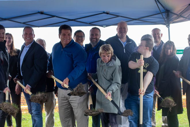 Local leaders break the ground at the groundbreaking ceremony for the CAT Park All-Inclusive Sports Field, on April 13, 2022, in Lafayette.