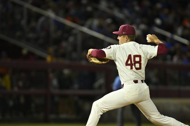 FSU pitcher Conner Whittaker delivers a pitch during the Seminoles' 5-0 win over Florida on Tuesday, April 12, 2022.